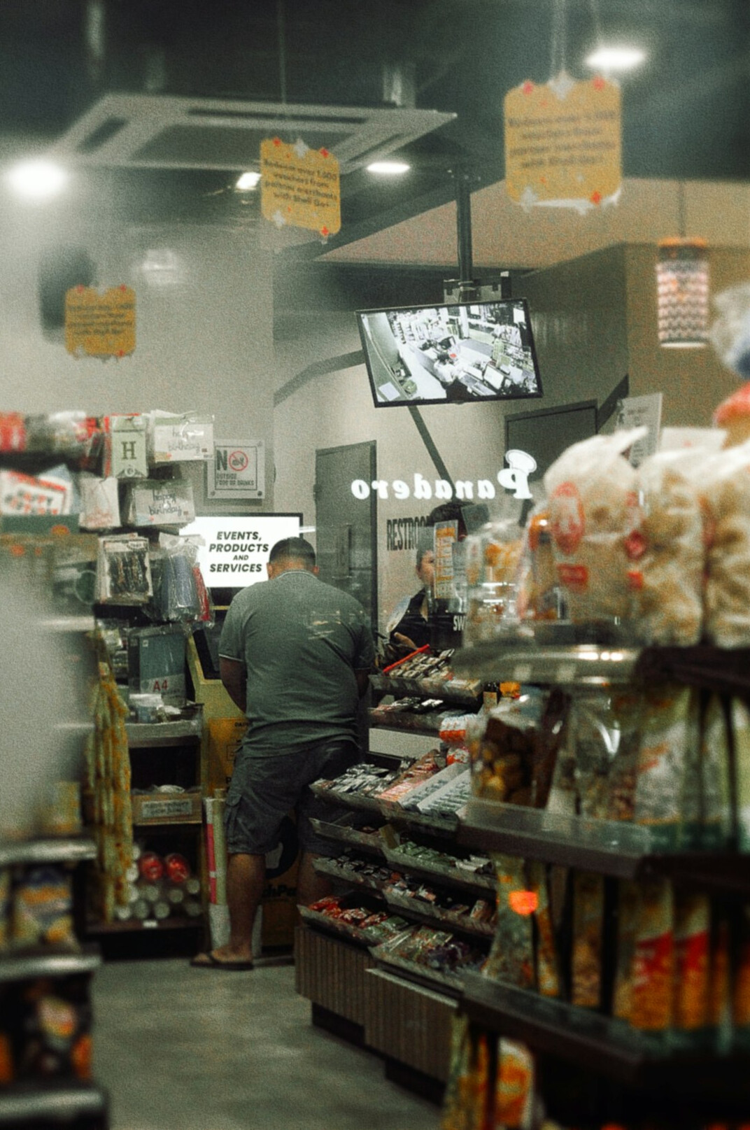 store security guard watching customer