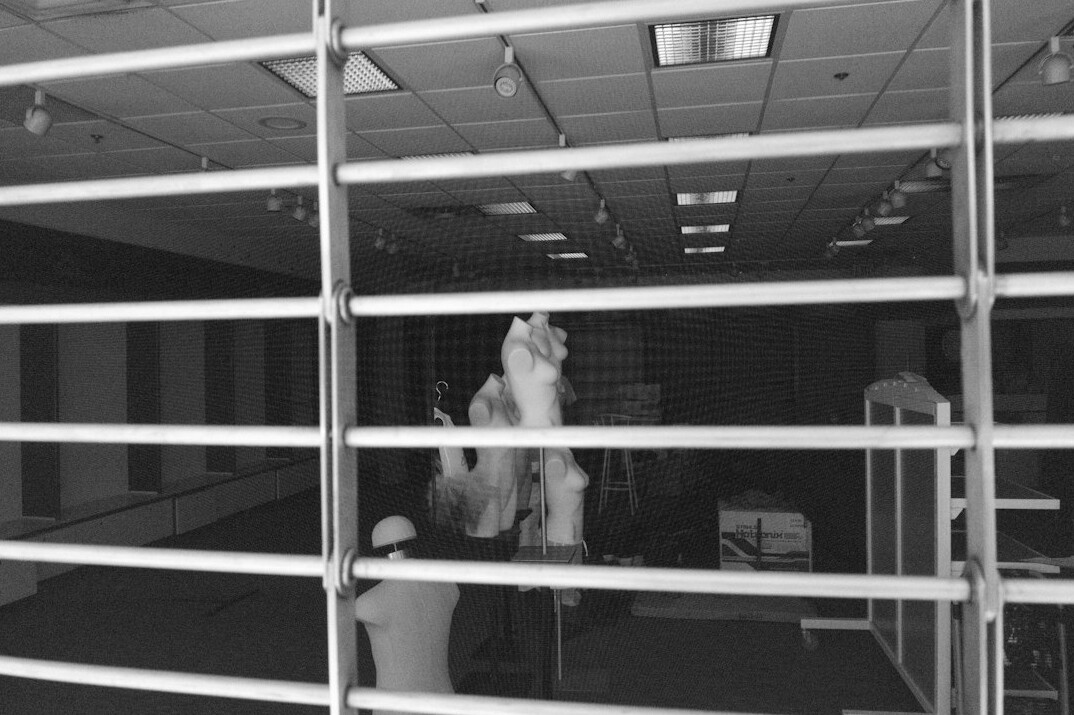 mall security guard watching cameras