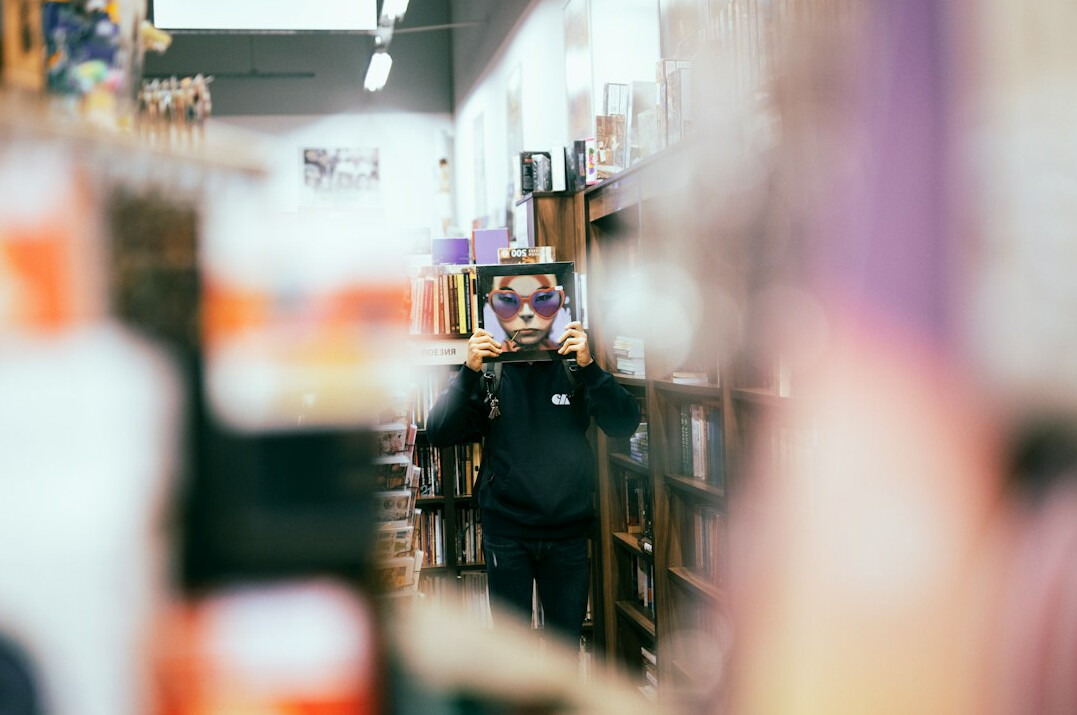 store security guard monitoring aisle